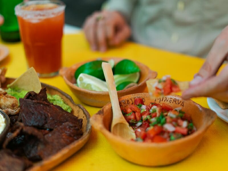 man trying Mexican food