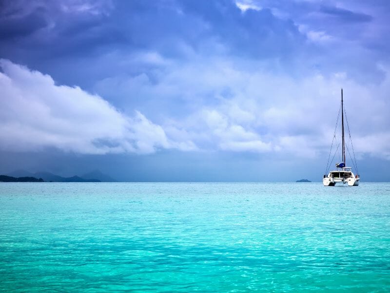 Catamaran and cloudy sky