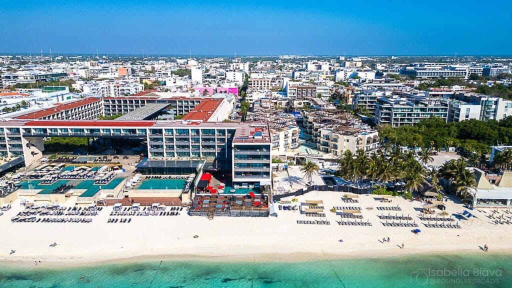 Aerial view of beachfront hotel in coastal city