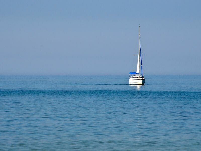 Boat in the sea grey sky