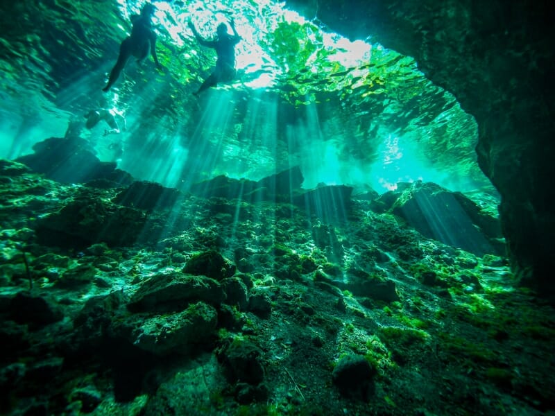 two people cenote diving in Cancun
