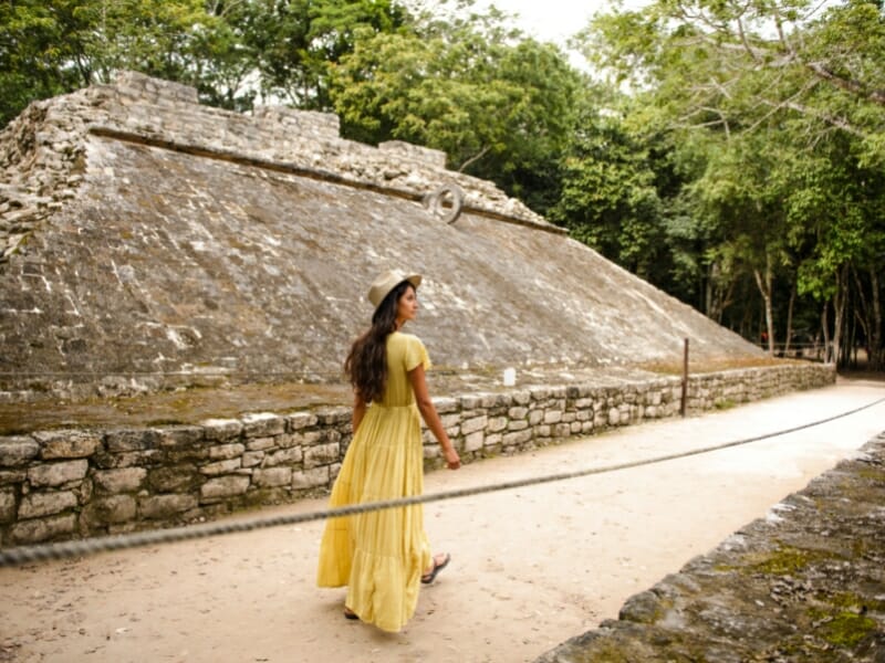 woman tourist visiting coba ruins in Mexico