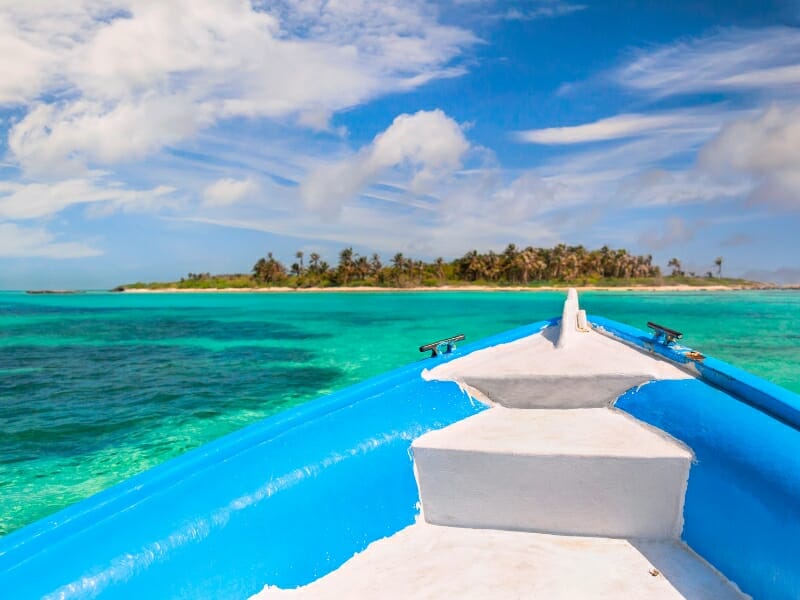 fishing and snorkelling boat approaching Isla Contoy