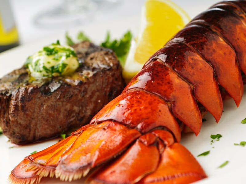 Filet mignon with lobster tail and wine