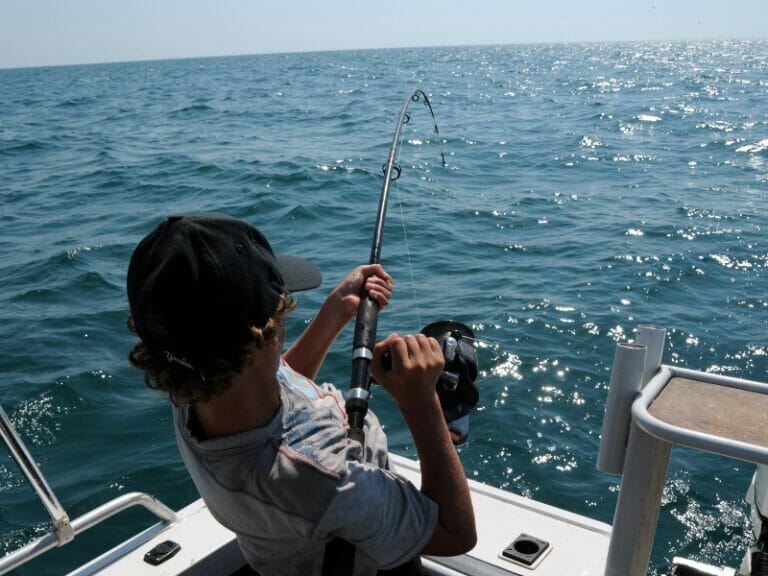 Man fishing on the sea