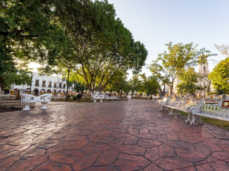 View of the Main Plaza in Valladolid with benches and trees