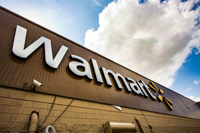 Walmart signage under a cloudy sky