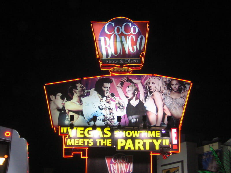 Coco Bongo in Cancun signage at night reading "Coco Bongo Show & Disco. Cancun. Vegas showtime meets the party."