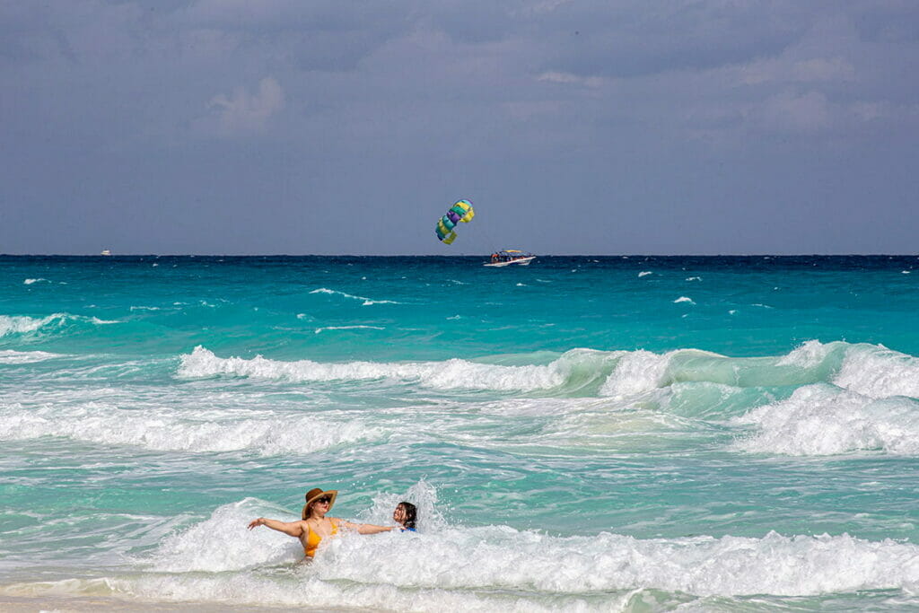 View of people swimming in Cancun beach.