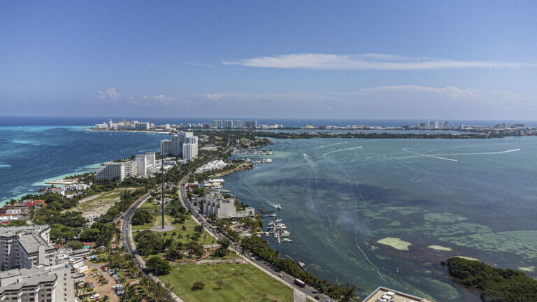 View of the Cancun Hotel Zone under a blue sky,