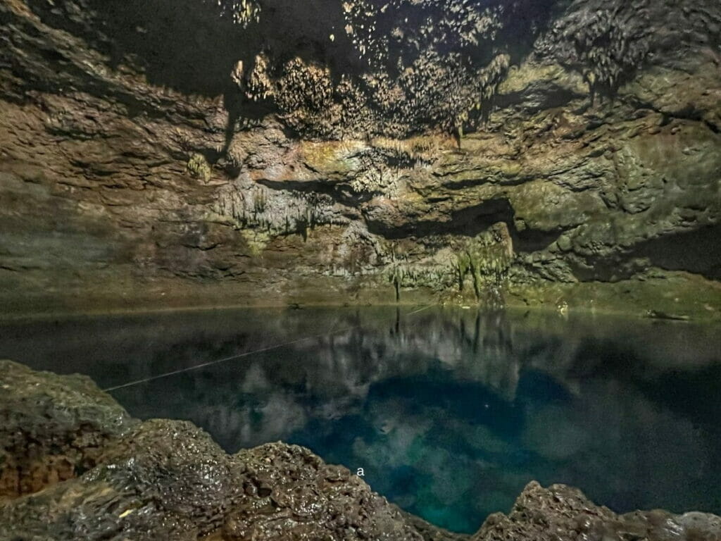 Turquoise water of Cenote Tancach Ha.