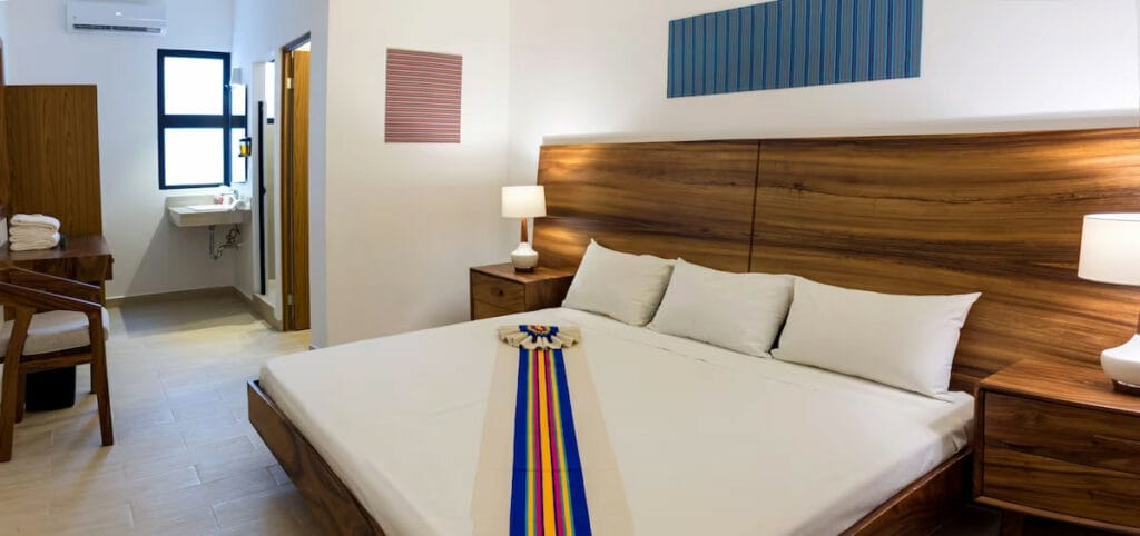 Nomads Party Hostel room with king size bed.