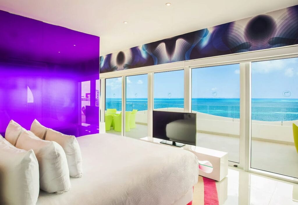 Modern style room with colorful wall design.