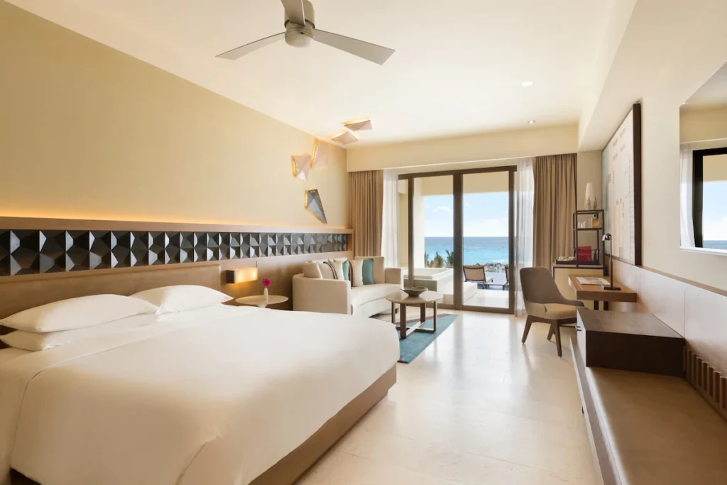 Cozy hotel in Cancun with bed and high-class furniture.