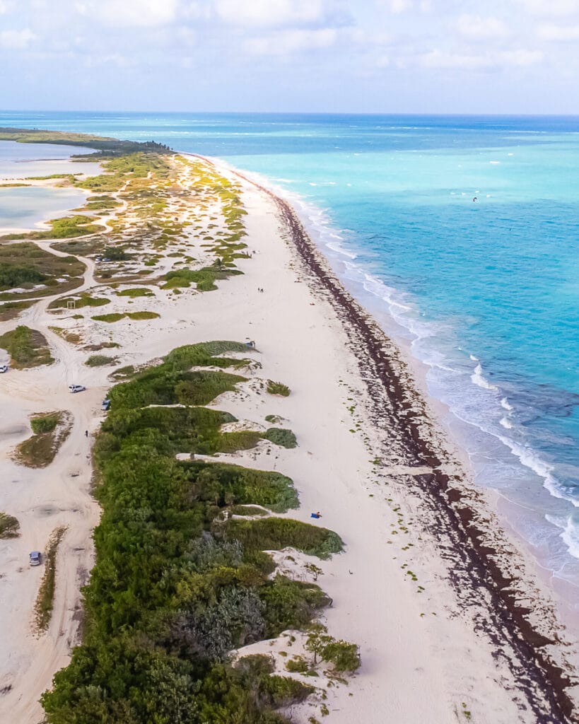 Long stretch of white sand beach
