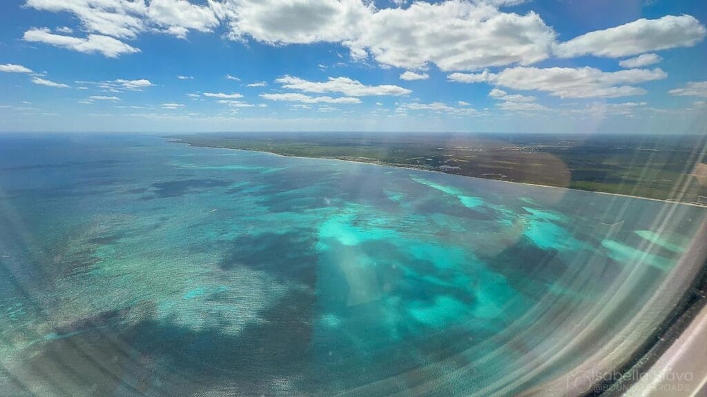 view of Caribbean Sea from the plane arriving at cancun airport