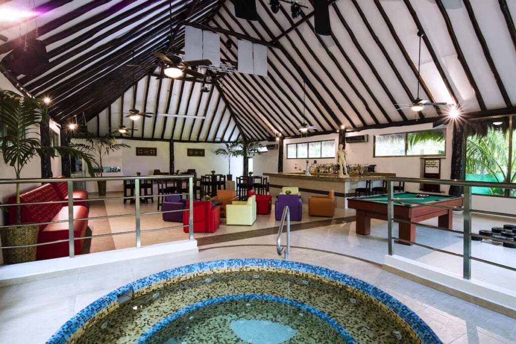 Spacious lounge with seating and jacuzzi